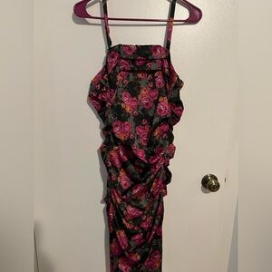 Moda international black dress with flowers body con dress. NWOT size 0
